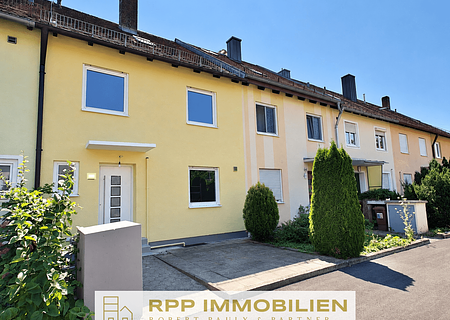 Renoviertes Reihenmittelhaus mit sonnigem Südgarten - ein Zuhause für Familien - Hausansicht