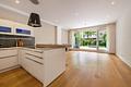 Moderne 2-Zimmer-Gartenwohnung mit Wintergarten und Deckenhöhen von 2,80m - Wohnen mit Gartenblick