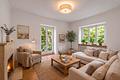 Altbauvilla mit Gewerbeanteil auf parkähnlichem Grundstück - Kaminzimmer (visualisiert)