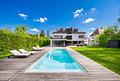 Moderne Architektenvilla mit exklusivem Interior-Konzept, Lift, Spa-Lounge, Home-Gym und Outdoorpool - Beeindruckendes Familiendomizil in ruhiger, gepflegter und familiengerechter Lage