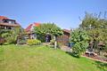 Doppelhaushälfte als Ein- oder Zweifamilienhaus mit Garage und sonnigem Garten - Garten