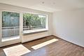 Wohnen mit Weitblick – stilvolles Split-Level-Reihenendhaus mit Garten am Pforzheimer Wartberg - Wohnzimmer