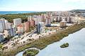 Appartements mit 2 Schlafzimmern, 2 Bädern, Tiefgaragenstellplatz, Gemeinschaftspool und schönem Ausblick nur 1.200 m vom Jachthafen und Strand