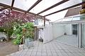 Großzügiges Wohnhaus mit Praxis, flexiblem Nutzungspotenzial und Gartenidylle - Pergola