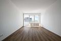 Über den Dächern Erdings – Helle 2-Zimmer-Wohnung mit Balkon und schönem Ausblick - Wohn- und Essbereich