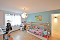 Charmante 4-Zimmer-Wohnung mit Garten & Garage in zentraler Lage in Muggensturm - Kinderzimmer