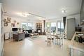 Moderne 2-Zimmer-Wohnung mit Terrasse und Garten in guter Lage - Wohn/-Essbereich Ansicht 1