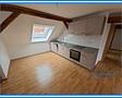 3-Raumwohnung unterm Dach in Köthen/Anhalt - Einbauküche ist dabei - Gartenhaus optional - 3-Raumwohnung in Köthen im Dachgeschoß - Wohnzimmer und Küche