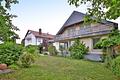 Großzügiges Wohnhaus mit Praxis, flexiblem Nutzungspotenzial und Gartenidylle - Gartenansicht