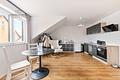 Jung. Modern. Energieeffizient. – Dachgeschosswohnung mit Balkon & Stellplatz - Wohnen + Essen + Kochen