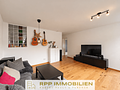 Renovierte 3-Zimmerwohnung mit sonniger West-Loggia in Oberschleißheim - Wohnzimmer