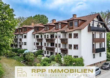 Lichtdurchfluteter Wohntraum mit 4-Zimmer-Option in parkähnlicher Umgebung in Oberschleißheim - Hausansicht