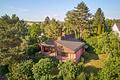 Zur Neugestaltung: Reizvolles Einfamilienhaus mit Sonnenterrasse und Garten in naturnaher Lage - Markante Architektur