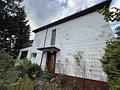Einfamilienhaus mit zusätzlichem Baugrundstück - Seitenansicht Eingang
