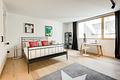 Mit Weitsicht geplant: Wohngesundes Architektenhaus mit Design-Ausstattung - Wohnliches Gästezimmer im Untergeschoss