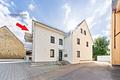 Jung. Modern. Energieeffizient. – Dachgeschosswohnung mit Balkon & Stellplatz - Hausansicht
