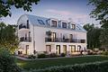 Großzügiges Apartment mit Terrasse – Investment mit besonderem Wohnkonzept - Außenansicht Abend