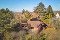 Zur Neugestaltung: Reizvolles Einfamilienhaus mit Sonnenterrasse und Garten in naturnaher Lage - Markante Architektur
