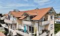 Flexibler DG-Wohntraum: Große Einheit, evtl. in 2 Wohnungen teilbar! Bad Aibling - Willing - Blick zur Wohnung - 4 x Balkon