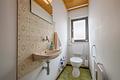 Charmante Erdgeschosswohnung mit Terrasse, Garten und Garage - WC
