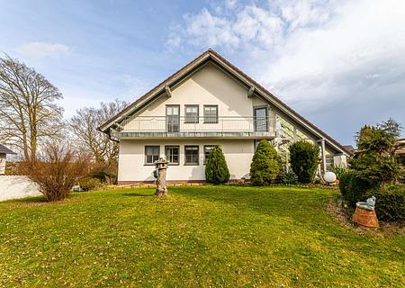 HEGERICH: Charmantes Einfamilienhaus mit Wintergarten und idyllischem Gartenparadies - Außenansicht