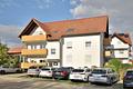 Gepflegte 2-Zimmer-Wohnung mit Balkon in Hatzenbühl – vermietet und ideal für Kapitalanleger - Hausansicht
