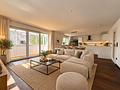 Sonnige DG-Wohnung - Wohnzimmer mit KI möbliert