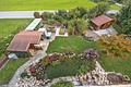 Mehrfamilienhaus mit 4 Wohnungen und idyllischem Garten - OG Balkonblick auf den Garten