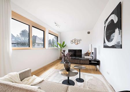 Sofort bezieh- oder vermietbar: Loft-Apartment am Perlacher Forst - ideale Kapitalanlage! - Wohnbereich