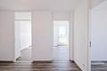 3-Zimmer Panorama-Eckwohnung im 10. OG mit Alpenblick, Südbalkon & Tiefgarage am Ostpark - Offener Empfang
