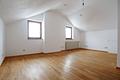 Ruhiges Mehrfamilienhaus mit 10 Parteien nahe S-Bahn-Station Grafing - Schlafzimmer große Dachgeschosswohnung