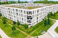 Ein Refugium für die Zukunft: Stilvolles Familienglück mit eigenem Garten in München - Hausansicht
