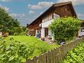 Attraktives Einfamilienhaus mit großem Potential
- Mit Einliegerwohnung
- Zum Eigennutz - Gartenansicht