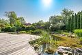 Einziehen & Wohlfühlen: Sofort verfügbares Einfamilienhaus mit Traumgarten auf ca. 1.300 m² Grund - Naturbadeteich mit Sonnendeck
