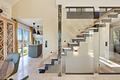 Stilvolles Familiendomizil mit Einliegerwohnung und spektakulärem Alpenblick - Treppe als Design-Statement