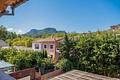 Mallorca, hübsches Stadthaus mit Garage und Garten im Zentrum von Puigpunyent zu verkaufen
