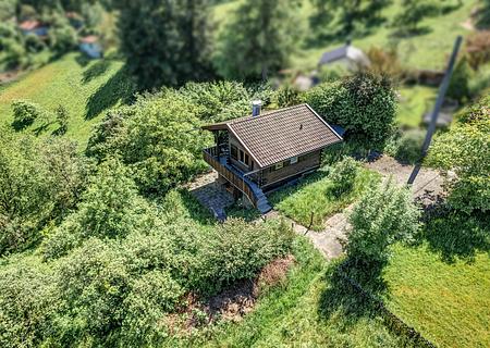 Charmantes Blockhaus in Spiegelberg: Auszeit, Weitblick und Natur pur auf großem Grundstück erleben! - Luftbild