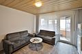 Helle 3-Zimmer-Erdgeschosswohnung mit Balkon und Einbauküche in Bad Friedrichshall - Wohnzimmer