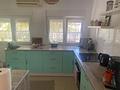 Villa mit 3 Schlafzimmern, 1 Badezimmer, Dachterrasse und Carport in ruhiger Lage