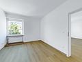 Frisch sanierte 2-Zimmer-Wohnung mit Balkon in zentraler Lage von Freilassing - Schlafzimmer