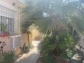 Villa mit 3 Schlafzimmern, 1 Badezimmer, Dachterrasse und Carport in ruhiger Lage