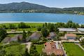 Exklusive Landhausvilla am Tegernsee mit hochwertiger Ausstattung I 5 Jahre Wohnrecht für Verkäufer - Drohnen-Aufnahme mit Blick zum Tegernsee