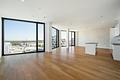 Loft-Style und 180°-Panorama: Design-Domizil im 14. Geschoss des Friends Tower 2 - Großzügiger Wohnbereich
