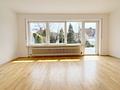 Modernisierte Doppelhaushälfte mit alteingewachsenem Traumgarten - Wohnzimmer