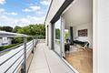 OPEN HOUSE-Besichtigung: Freitag, 21. August | 18-19 Uhr: Faszinierendes Penthouse mit Dachterrasse - Wohnzimmer mit Dachterrasse
