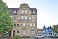 Charmanter Altbau nahe Hauptbahnhof: 4 Wohnungen / 21 Zimmer, Innenhof, Balkone & sehr gute Rendite - Frontansicht Gebäude