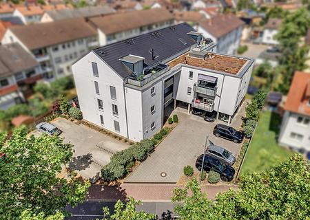 Neuwertige 2-Zimmer-Erdgeschosswohnung mit Terrasse, Garten und Stellplatz in Hockenheim - Außenansicht