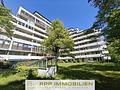 Stilvolle Split-Level-Wohnung mit Blick ins Grüne in Unterschleißheim - Hausansicht