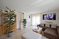 Funktionale 2-Zimmer-Wohnung mit Garage und großer Lagerhalle – solides Objekt mit Potenzial - Wohnzimmer
