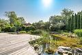 Einziehen & Wohlfühlen: Sofort verfügbares Einfamilienhaus mit Traumgarten auf ca. 1.300 m² Grund - Naturbadeteich mit Sonnendeck